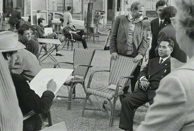 フランスの首都パリを初訪問した池田先生（１９６１年１０月）。「開道」の章では、パリのテルトル広場で青年画家に似顔絵を描いてもらう場面が記されている