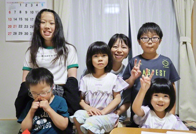 日頃から関わる地域の未来っ子たちと記念のカメラに