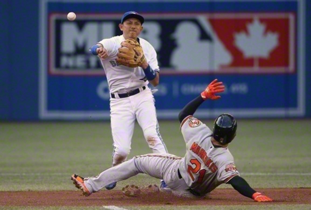 メジャーリーグで華麗な守備をみせる川﨑さん（2014年8月、カナダ・トロントで）©Getty　Images