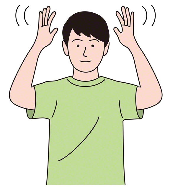 ①両手を顔の横でひらひらさせる