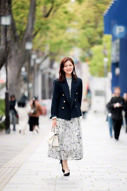 夢の道をさっそうと行く早川さん。「信心が土台にあるから、負けるわけない！って思えるんです」