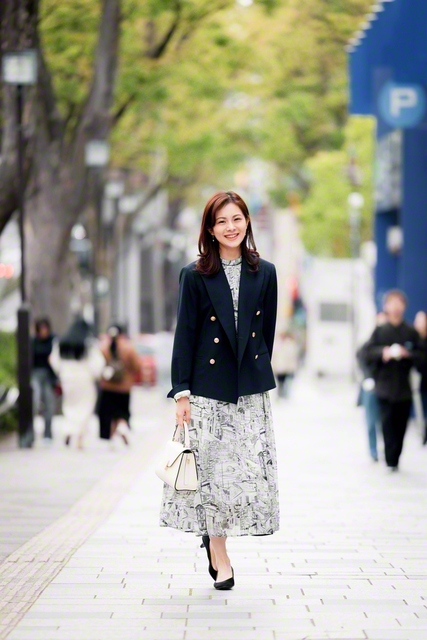 夢の道をさっそうと行く早川さん。「信心が土台にあるから、負けるわけない！って思えるんです」