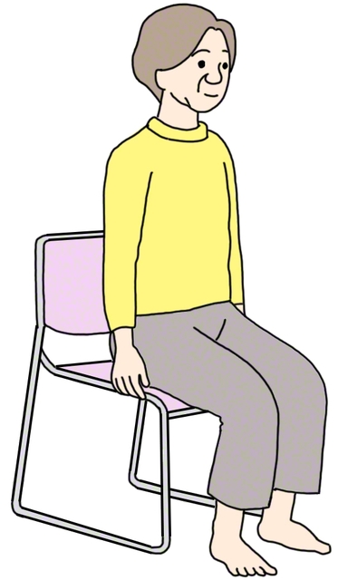 安全のため両手でしっかりと椅子をつかむ。