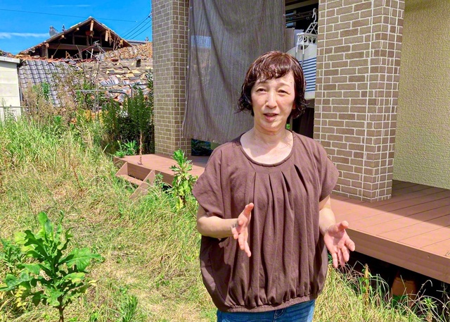 泉さんは「戦おうと決めたところから解決し始める」と。自宅の庭で