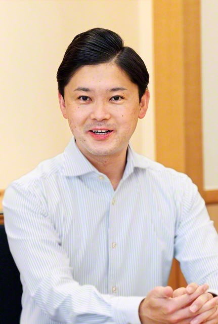 梁島男子部長
