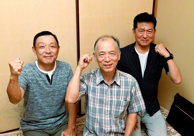 下半期の躍進を誓う竹田さん㊥。先頭を走る壮年部の仲間と