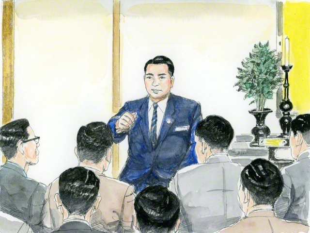 無罪判決が出た後、関西本部で「大阪事件」について語る山本伸一（内田健一郎画）