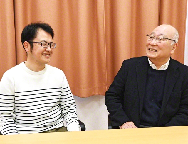 広布の最前線を二人三脚で駆ける水上さん㊨と須賀地区部長