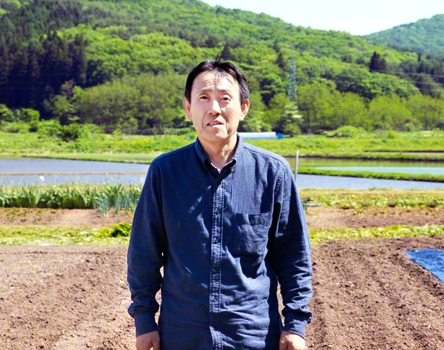 自宅裏の田畑では農作業にも励む本堂さん