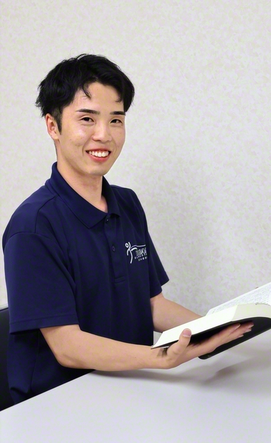安廣賢一さん