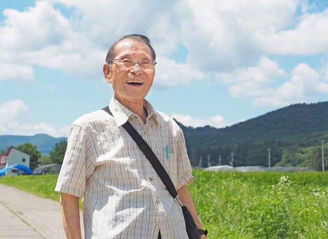 大好きな“大楠公”の曲を口ずさみながら、芳賀沼さんは今日も朗らかに地域を歩く